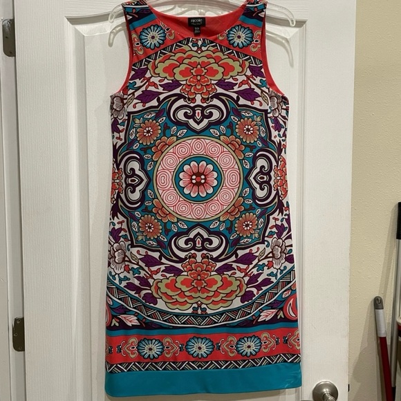 NICOLE MILLER SLEEVELESS STRETCHY DRESS.
LIKE NEW! COLORFUL FLORAL MANDALA PRINT - Picture 4 of 10
